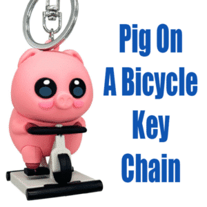 Pig On A Bicycle Keychain